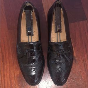 Dark brown men’s tasseled loafers